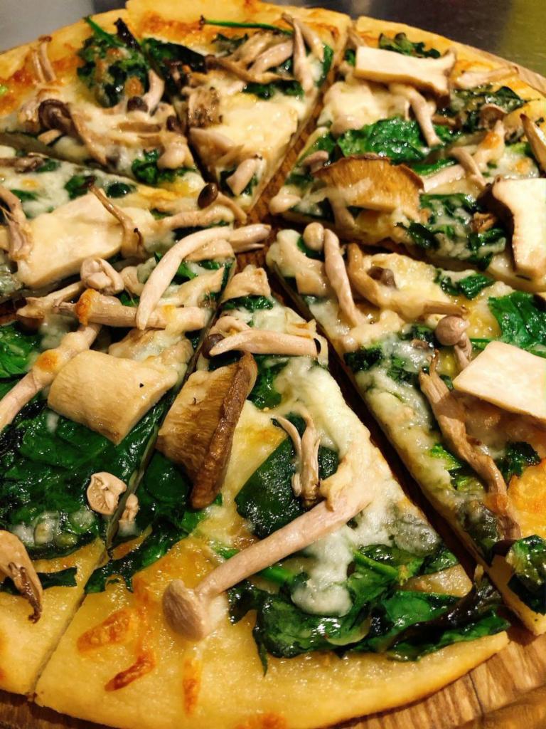 SPINACH & MUSHROOM PIZZA · Mozzarella cheese, Shimeji & Oyster mushrooms, spinach, garlic olive oil
