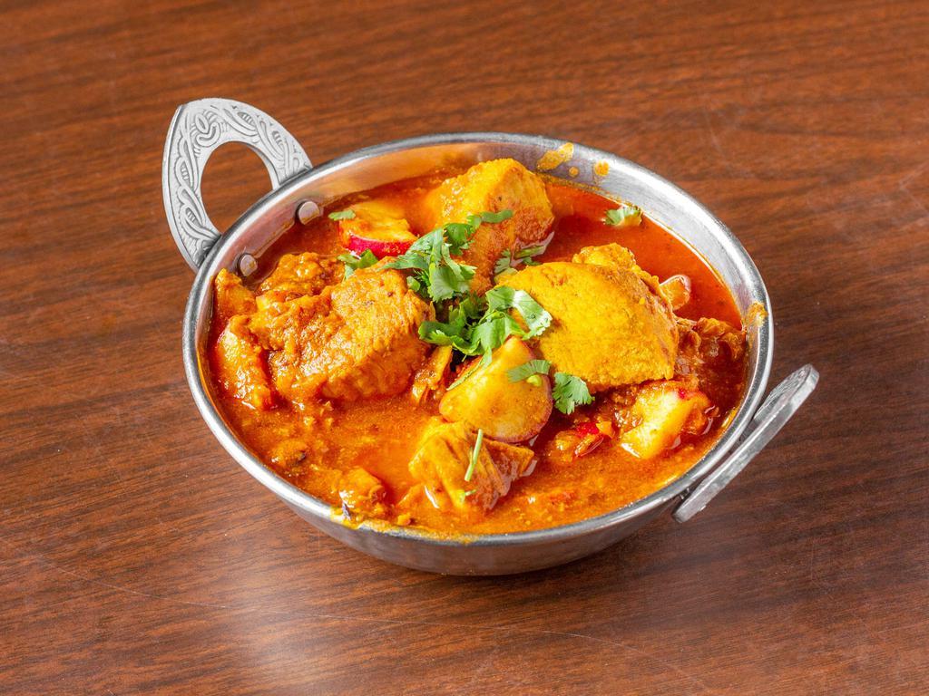 Nepal House Special Biryani · Basmati rice flavored with saffron, cooked with combination of vegetables, chicken, lamb, shrimp, saffron, carrots, peas, cauliflower and tomatoes.