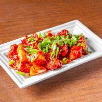 Chili Chicken · Chicken cooked with bell pepper, onion, soy sauce, ketchup and jalapeno slices in an Indo-Ch...