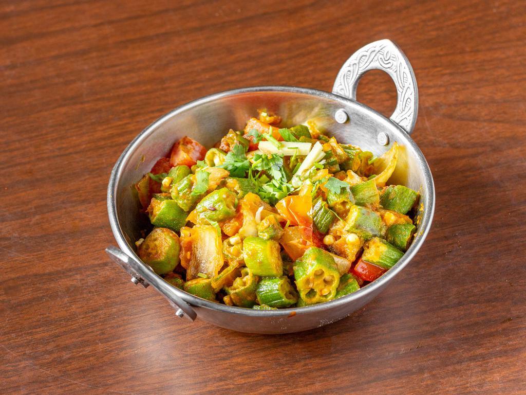 Bhindi Masala · Okra cooked with onions and delicious tangy spices. Served with aromatic basmati rice.