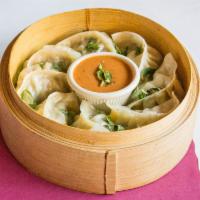 Vegetable Nepali Momo · Steamed dumpling with vegetable. Momo has become traditional delicacy in Nepal.