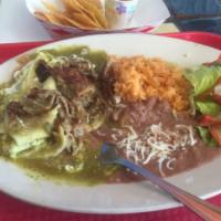 Enchiladas Plate · Two enchiladas of your choice with your choice of red or green salsa and beans. Served with ...