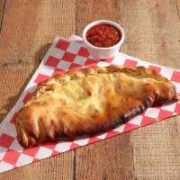 The Urban Calzone Plate · Stuffed with ricotta cheese filling, fresh roasted garlic and mozzarella cheese – served wit...
