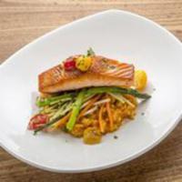 Pan Roasted Organic Salmon · Saffron risotto, asparagus, julienne vegetables, yellow and red tomato.