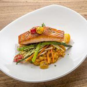 Pan Roasted Organic Salmon · Saffron risotto, asparagus, julienne vegetables, yellow and red tomato.