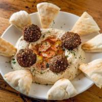 Hummus ·  Tahini, pita.Choice of Falafel  OR Lamb