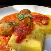 Meatballs and Polenta · baked squares of polenta with house meatballs and tomato sauce
