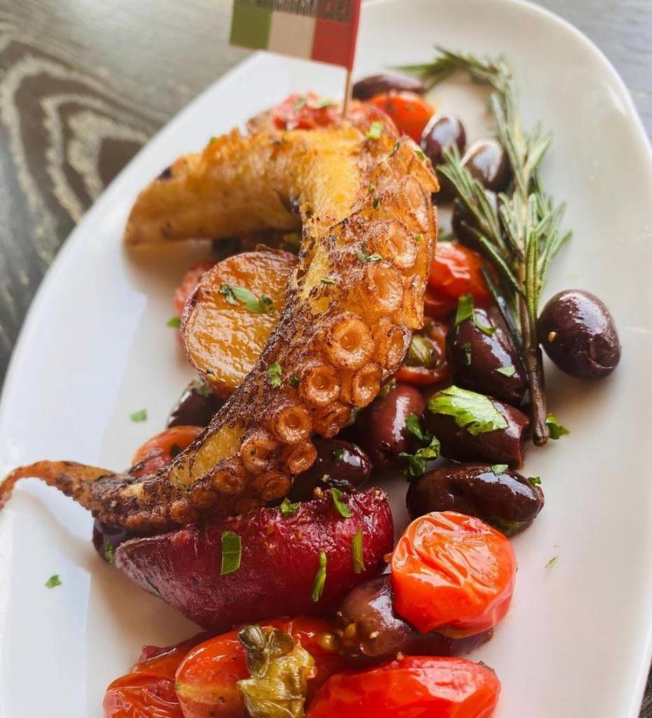 Polipo Alla Mediterranea · Portugese Octopus served with Kalamata olives, cherry tomatoes, capers and potatoes.