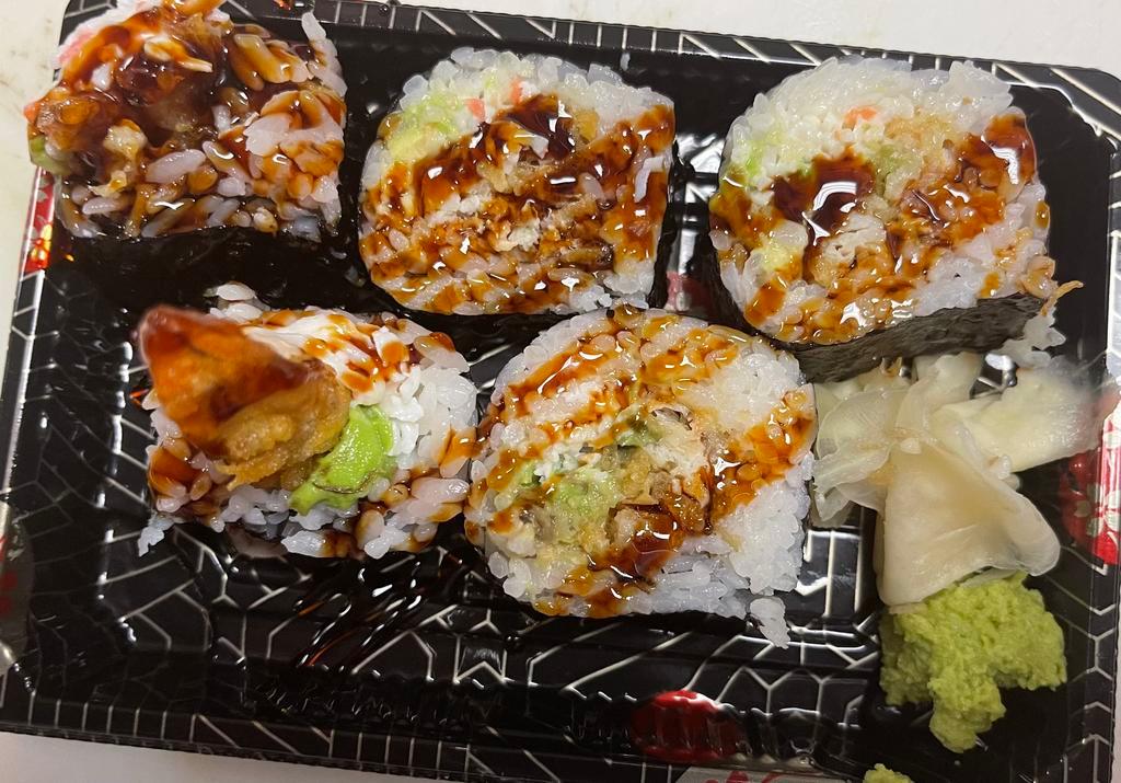 Spider roll · Inside soft shell crab,crab meat and avacado,topped eel sauce