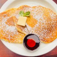 Stack of 3 Pancakes · 3 Fluffy Buttermilk, Strawberry, Banana, or Chocolate Chip Pancakes served with Syrup & Butter