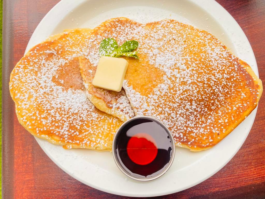 Stack of 3 Pancakes · 3 Fluffy Buttermilk, Strawberry, Banana, or Chocolate Chip Pancakes served with Syrup & Butter