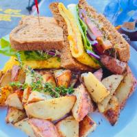 Breakfast Sandwich · Whole Wheat Toast, Egg Omelette, Cheddar Cheese, Tomato, Lettuce, Onion, Alfalfa Sprouts, Ch...