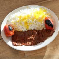 Barg Kabob Beef · Filet mignon, pounded, marinated and skewered, grilled over open flames, served with basmati...