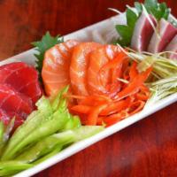 Sashimi Fusion · Raw. 3 piece each: salmon, tuna and yellowtail in a special sauce.