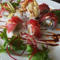 Red Spider Maki · Raw. Soft shell crab topped with tuna, tobiko and scallions with unagi sauce.