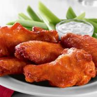 Chicken Wings · Smothered in Frank's Red Hot Sauce or Sweet Baby Ray's BBQ Sauce, served with carrots, celer...