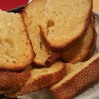 4 pieces Garlic Bread · Slices of sourdough bread with garlic butter. Vegetarian.