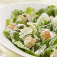 Caesar Salad · Hearts of romaine lettuce, tomato wedges, fresh Parmesan, tossed with our homemade croutons ...
