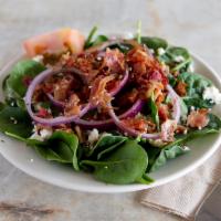 Spinach Salad · Baby spinach, red onions, feta cheese, and crispy bacon with balsamic vinaigrette dressing.