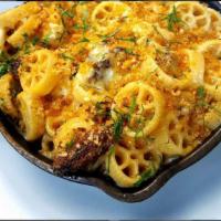 Beef Short Rib Mac and Cheese · Pasta wheels, Gruyere, raclette and sharp cheddar melted with braised beef short rib, topped...
