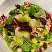 ROASTED BRUSSELS SPROUT SALAD · radicchio, baby spinach, dried cranberries, apple
cider vinaigrette, green tahini, sesame se...