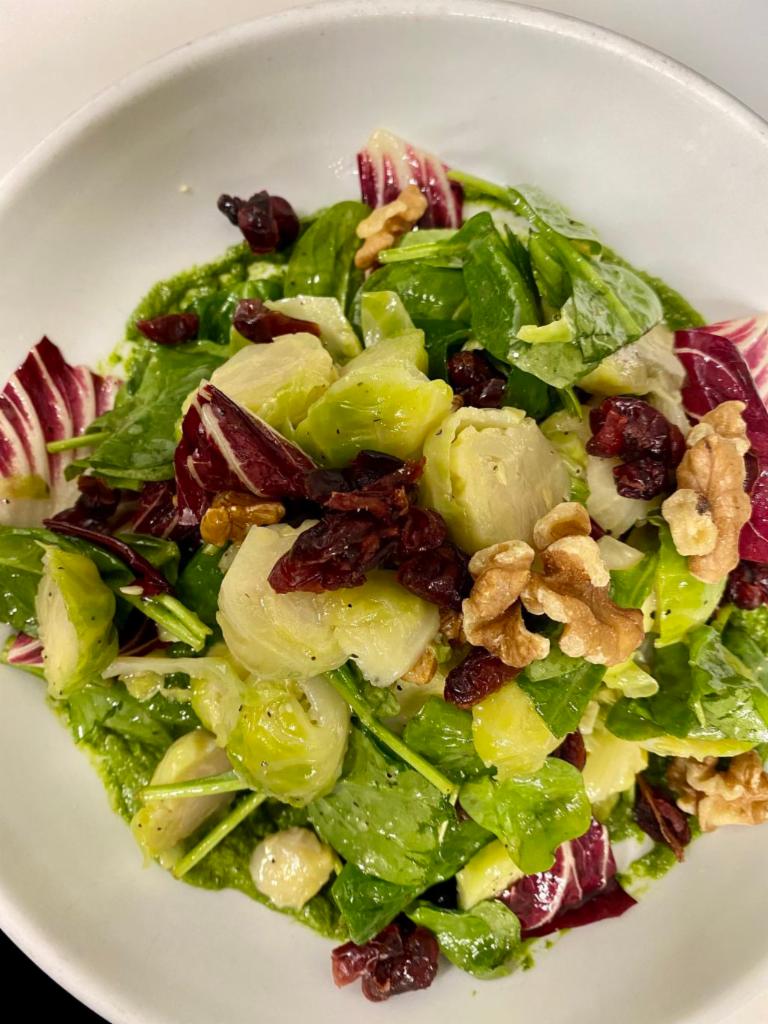 ROASTED BRUSSELS SPROUT SALAD · radicchio, baby spinach, dried cranberries, apple
cider vinaigrette, green tahini, sesame seeds,
walnuts