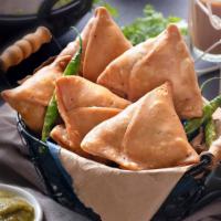 Samosa's · 2 piece of vegan pastry. Potatoes mixed with vegetables, seasonings and wrapped in a light p...