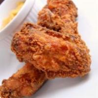 Asian Ginger Wings炸鸡翅 · Cooked wing of a chicken coated in sauce or seasoning.