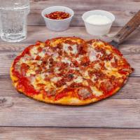 Meat Lovers Thin Crust Pizza · Cheese, sausage, pepperoni, Canadian and American bacon. 