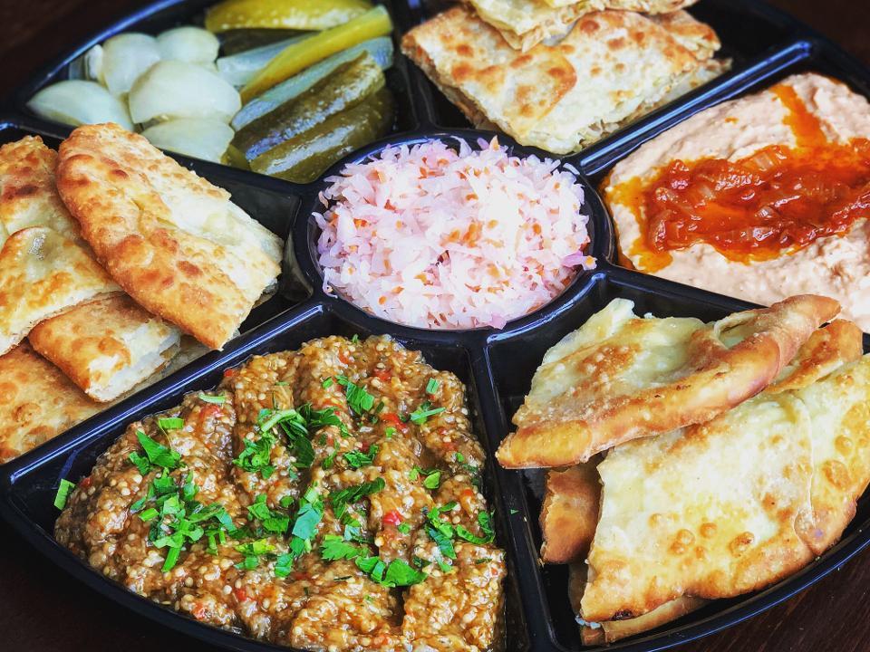 Appetizer platter · Eggplant, bean paste, pickled vegetables and pan fried pie with potatoes, cabbage and cheese. Feeds 6-8 people.