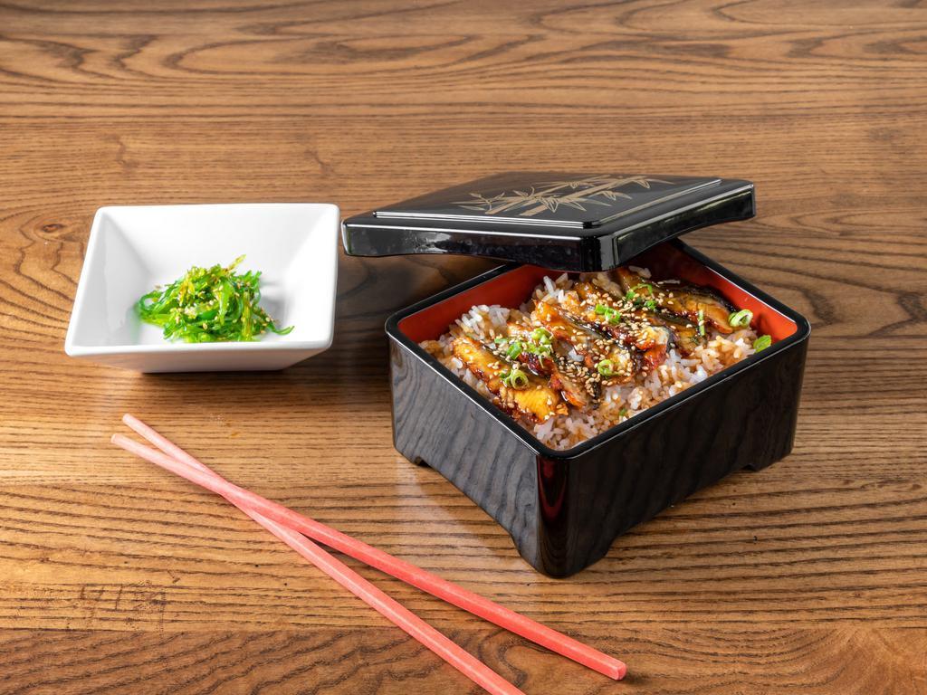 B-06. Eel Rice · 6 slices of BBQ unagi on a bed of rice, with seaweed salads.