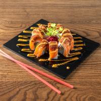 H-15. Tuna/Salmon Delight Roll · Crab mix, cucumber, and avocado topped with fresh salmon, spicy tuna, spicy mayo, eel sauce,...