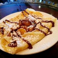 Caramelized Banana Nutella Crepe · Crepe with Fresh Cut Banana Cooked in Caramel Sauce and Nutella
