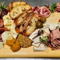 Charcuterie + Cheese Board · cured meats and artisan cheeses, fruits, nuts