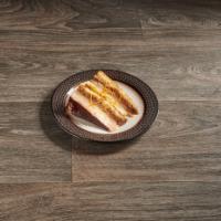 Tiramisu · Espresso infused cake layered with fresh mascarpone cheese & whipped cream. Beautiful light ...