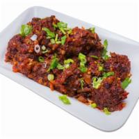 Vegetable Manchurian · Vegetarian deep fried balls tossed with soya sauce based gravy cooked to the chef’s perfecti...