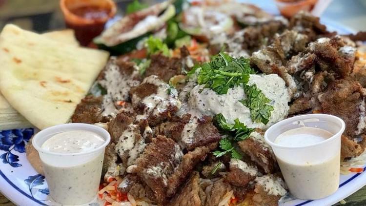 Gyro Platter · Gyro, salad, rice, tzatziki, hummus, pita bread.