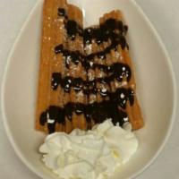 Cajeta Churros · Fried dough filled with cajeta caramel sprinkled with cinnamon maple sugar and drizzled with...
