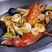 Mariscada · Salsa verde, a la marinera, o ajillo half a lobster, clams, mussels, shrimp, scallops and ca...