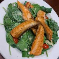 Grilled Salmon Salad · Grilled salmon over a spinach salad, almonds and a honey mustard dressing.