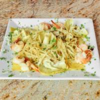 Shrimp Scampi · Succulent shrimp sauteed with garlic butter, white wine and lemon sauce.
