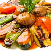 Grilled Veggie · Grilled zucchini, eggplant, mushroom, tomatoes and green peppers. Served over smoked eggplan...