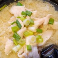 Chicken Rice Soup · Thai style porridge with mild seasoning, black pepper, green onions, and chicken.