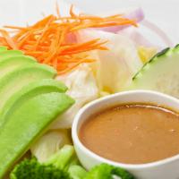 Bangkok Salad · Mixed fresh vegetables with avocado and peanut sauce dressing.
