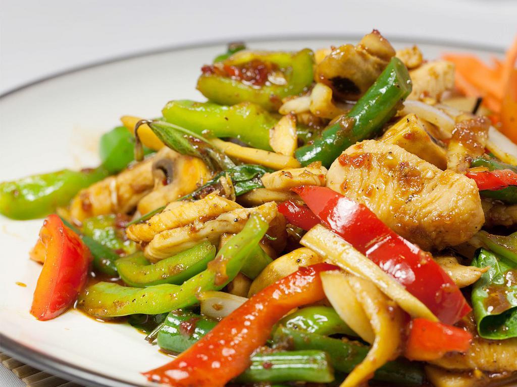 Pad Prik Khing  · Stir-fried green beans, bell peppers, and carrots in red curry paste.
