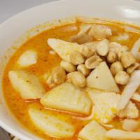 Massamun Curry  · Curry with onions, peanuts, and potatoes in massamun curry paste.

