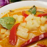 Pineapple Curry  · Curry with pineapples, bell peppers, and carrots in sweet curry paste.
