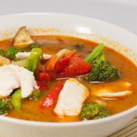 Jungle Curry  · Mushrooms, eggplant, carrots, cabbage, broccoli, baby corn, zucchini, and green beans in zes...