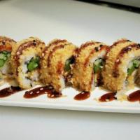 Crunch Roll · Shrimp tempura, cucumber, and asparagus inside, tempura flakes on the outside with eel sauce...