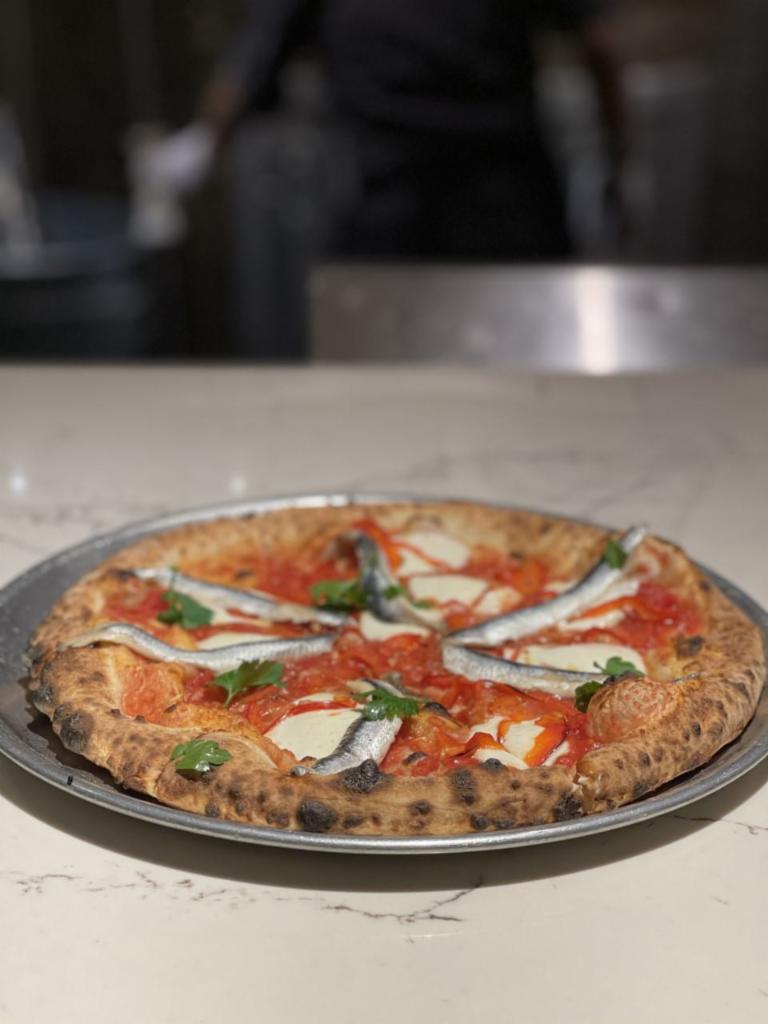  Boquerones Pizza · White anchovy, mozzarella, grana padano cheese, bell pepper with Italian parsley and extra virgin olive oil.